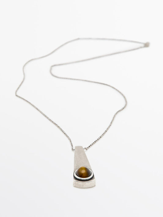 Geometric pendant with stone