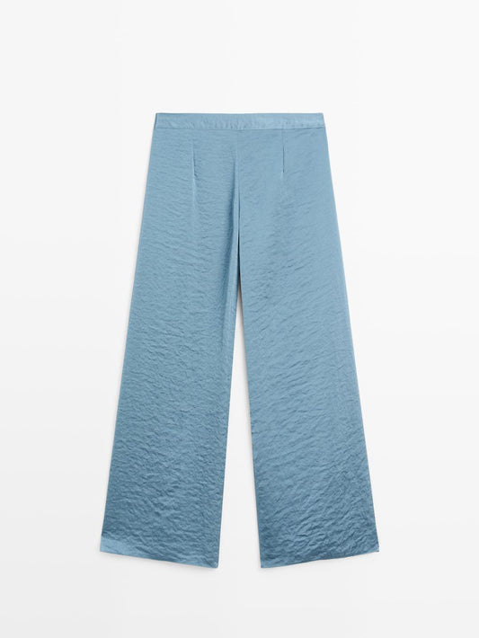 Flowing palazzo trousers with slits