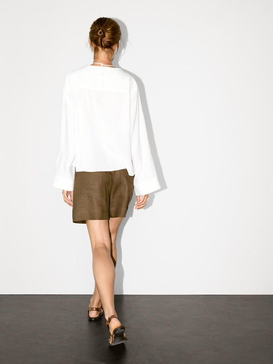 Flowing linen blend blouse with V-neckline