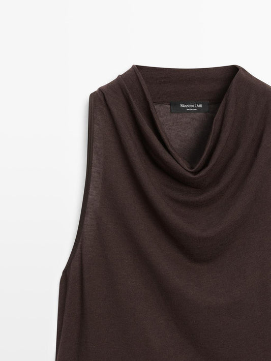 Sleeveless top with draped neckline