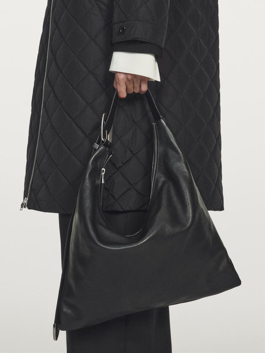 Long water-repellent oversize quilted parka