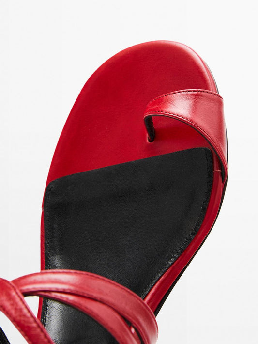 Leather sandals with criss-cross straps