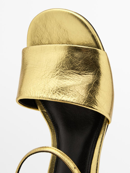 Golden slide sandals