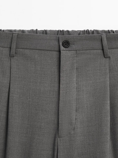 Relaxed fit trousers with darts