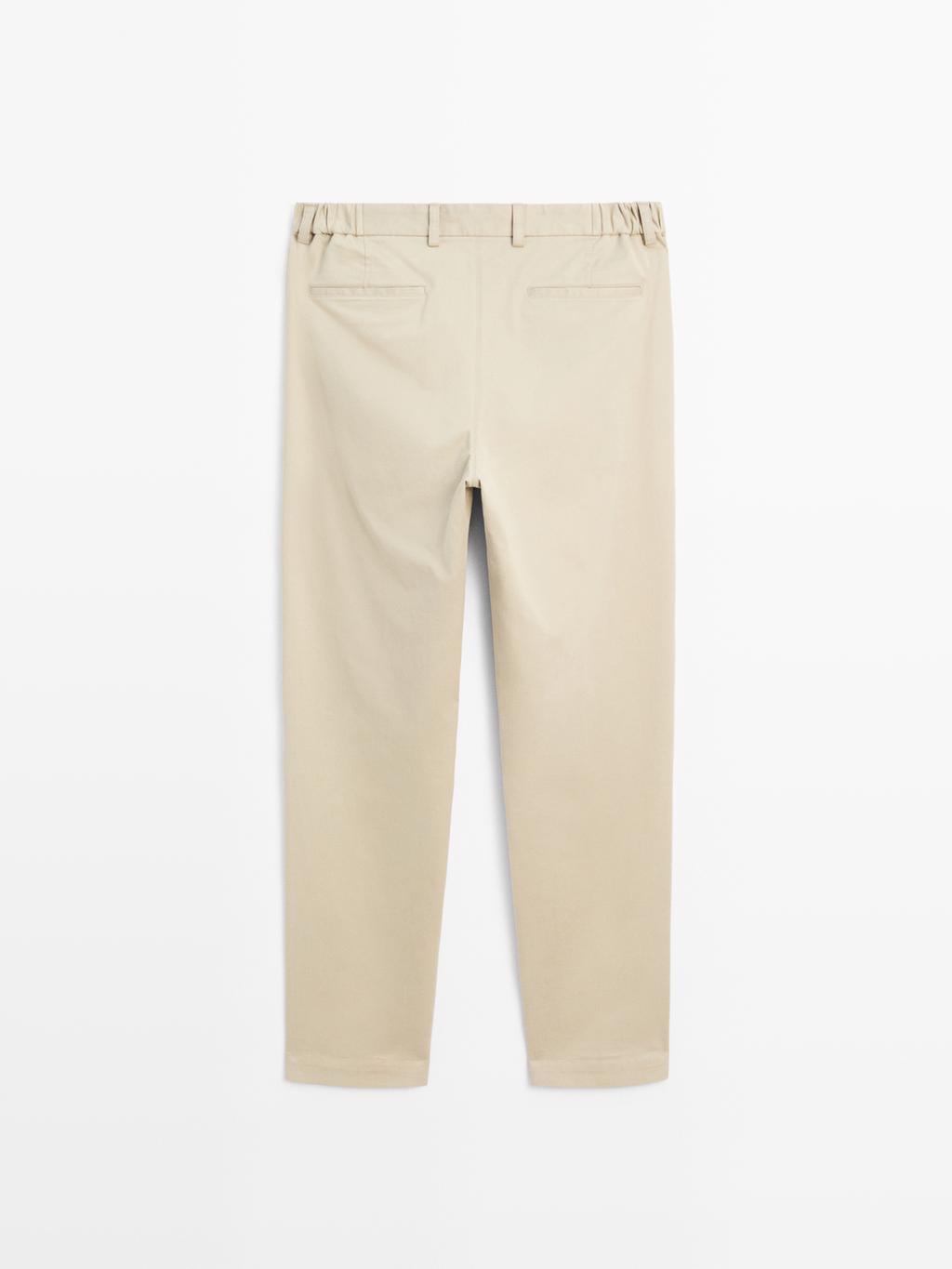 Slim fit trousers with elastic side detail