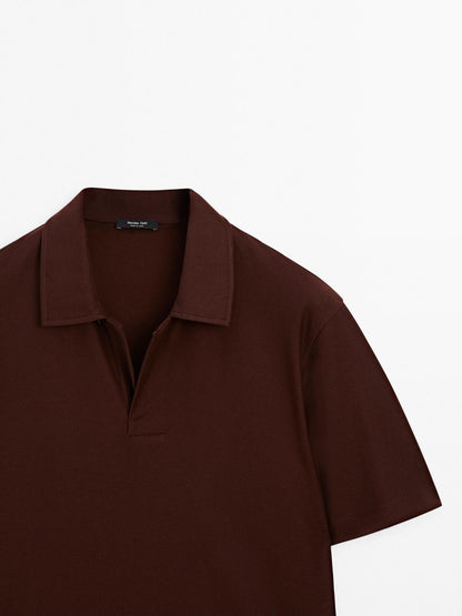 Textured polo shirt with hidden button