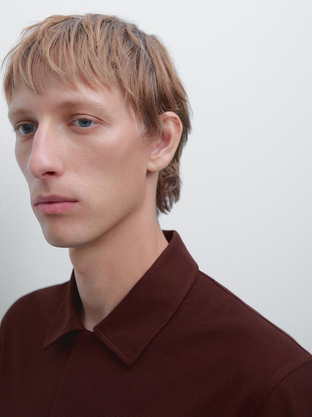 Textured polo shirt with hidden button