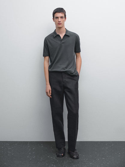 Short sleeve polo shirt with snap-button placket