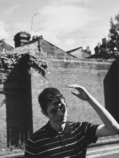 100% cotton striped knit polo shirt