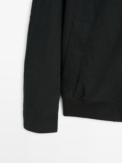 Peach-effect jacket with elbow patch details