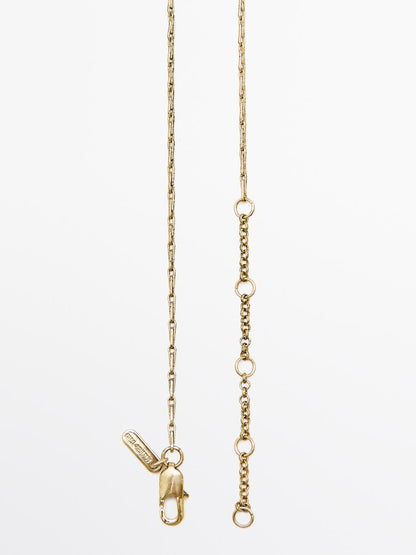 Long cocoa tassel pendant