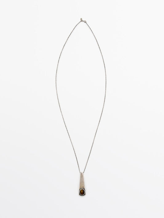 Geometric pendant with stone