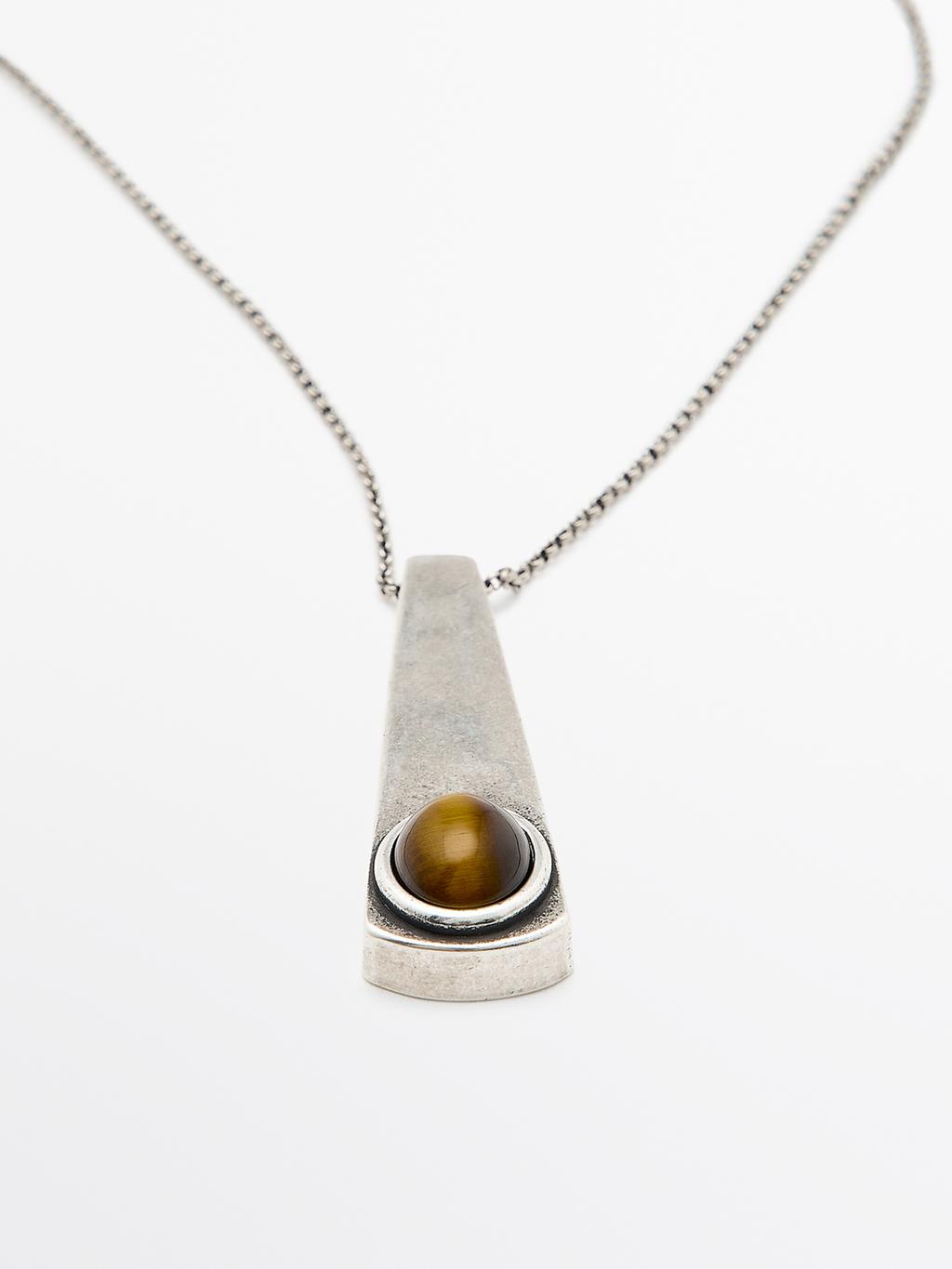 Geometric pendant with stone