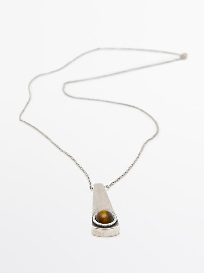 Geometric pendant with stone
