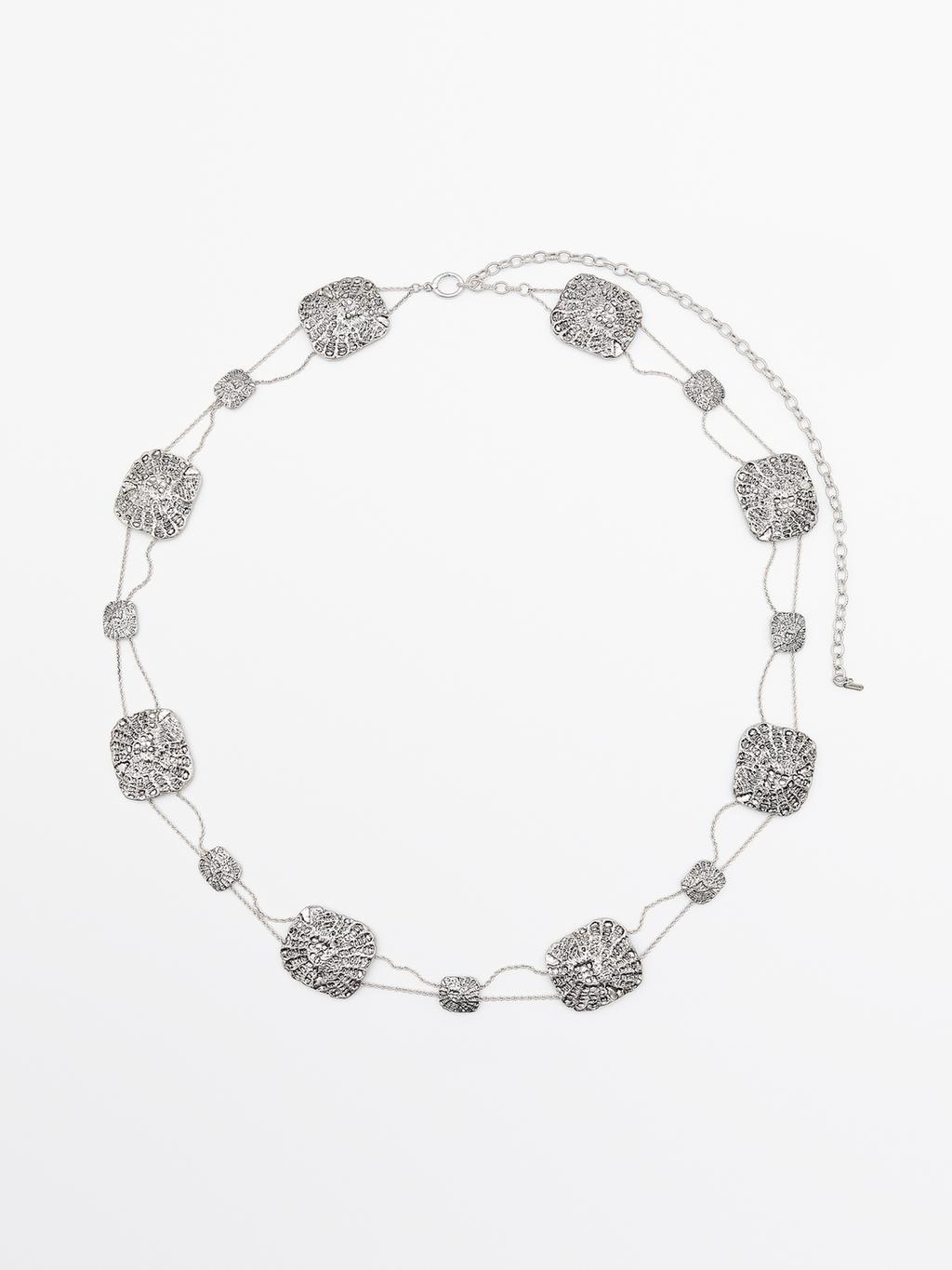 Textured medallion chain belt