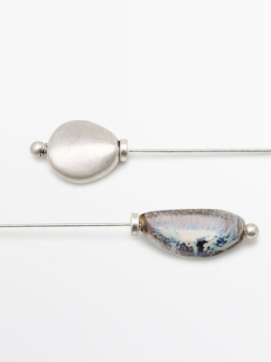 Brooch with ceramic leaf piece