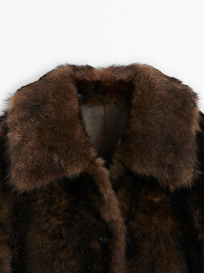 Short leather coat with fur