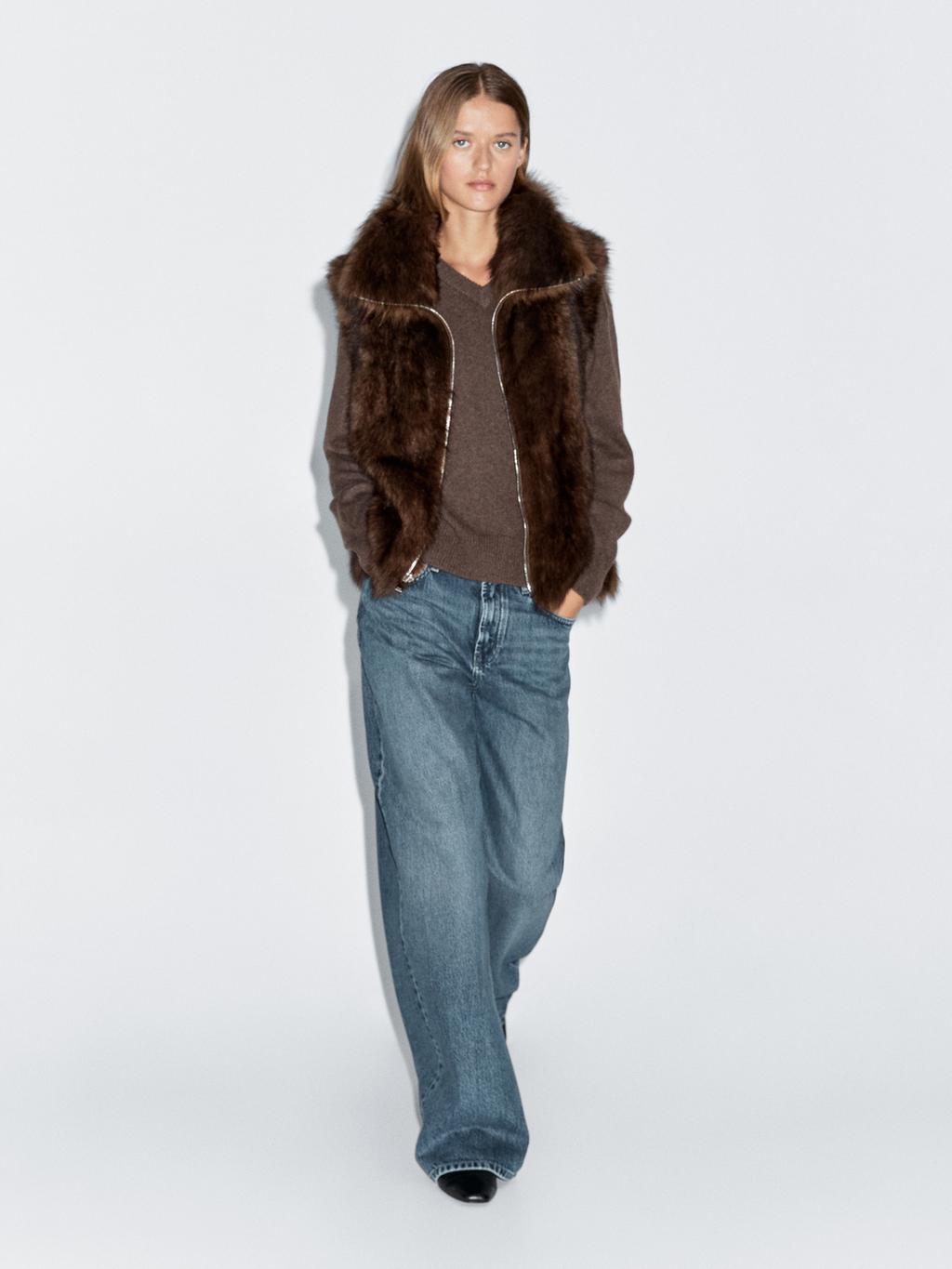 Leather high-neck waistcoat with fur