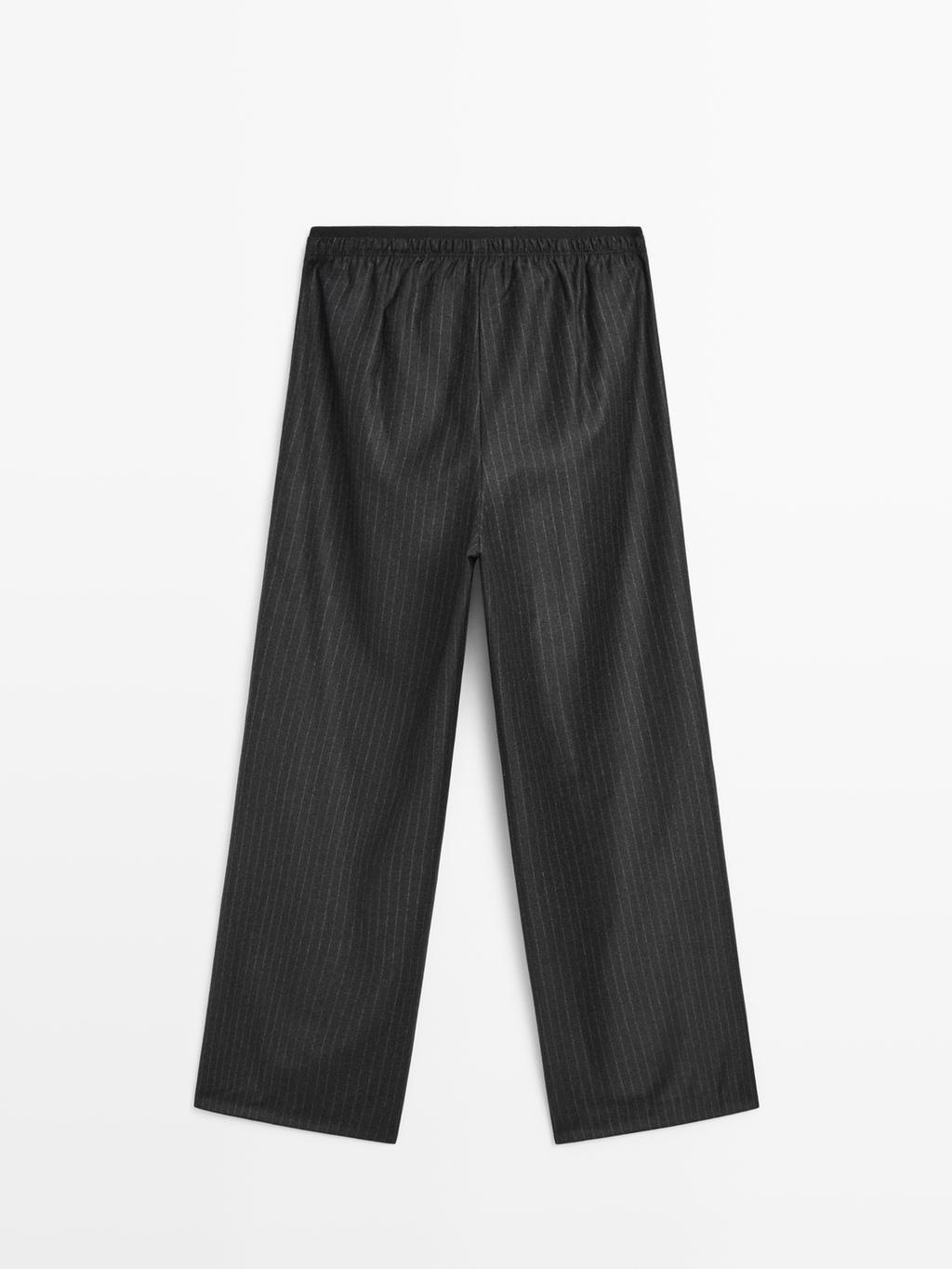 Darted pinstripe trousers