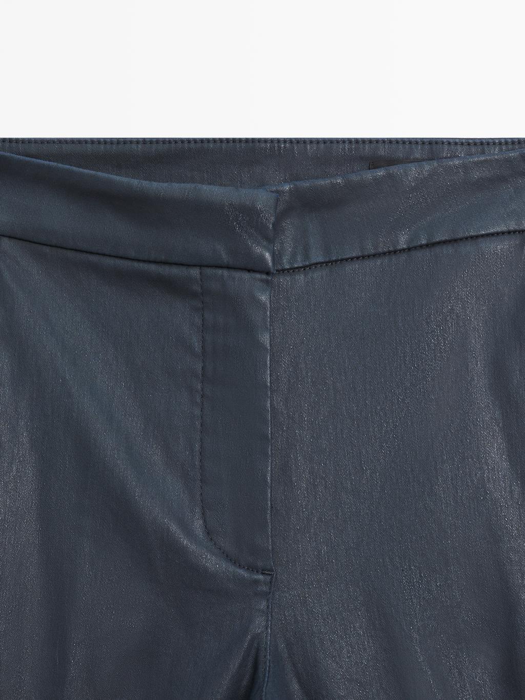 Waxed flare fit trousers