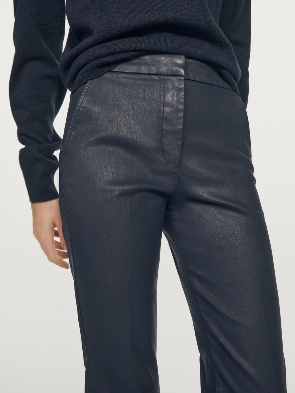 Waxed flare fit trousers