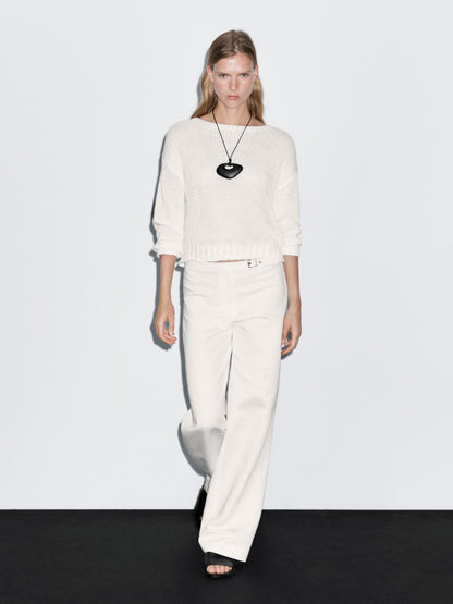 Straight-fit trousers with buckle detail