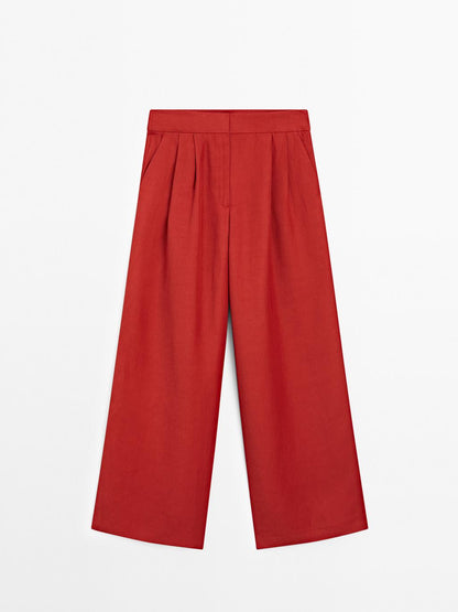 Flowing trousers with darts