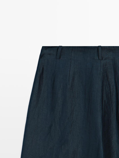 Loose-fitting linen blend trousers