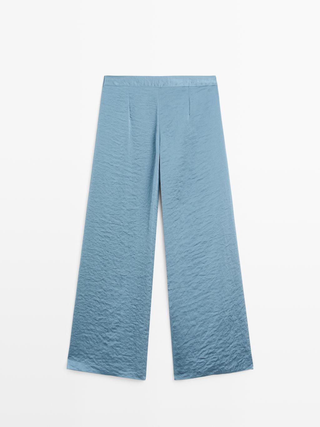 Flowing palazzo trousers with slits