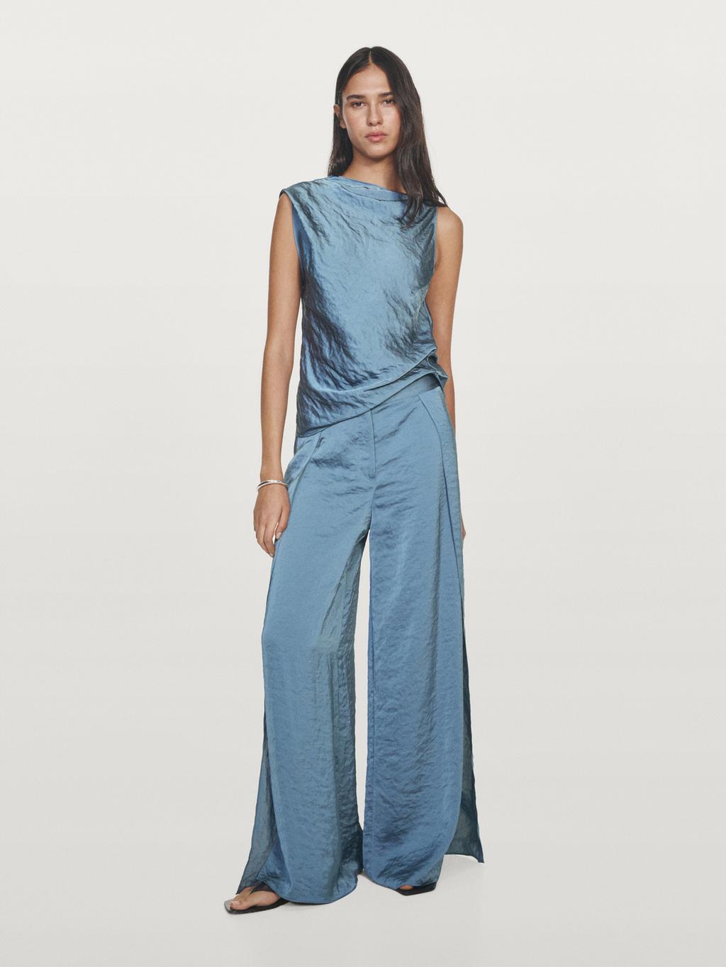 Flowing palazzo trousers with slits