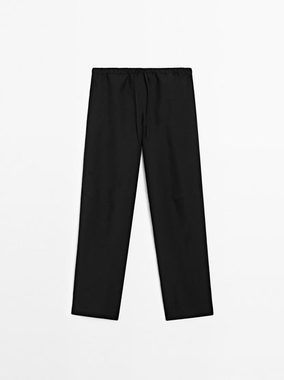 Flowing linen blend barrel fit trousers