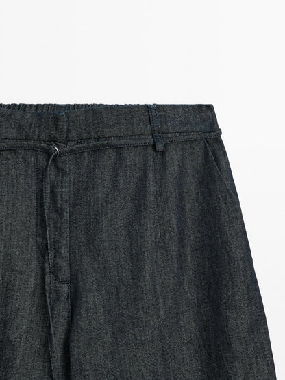 High-waist wide-leg jeans with belt