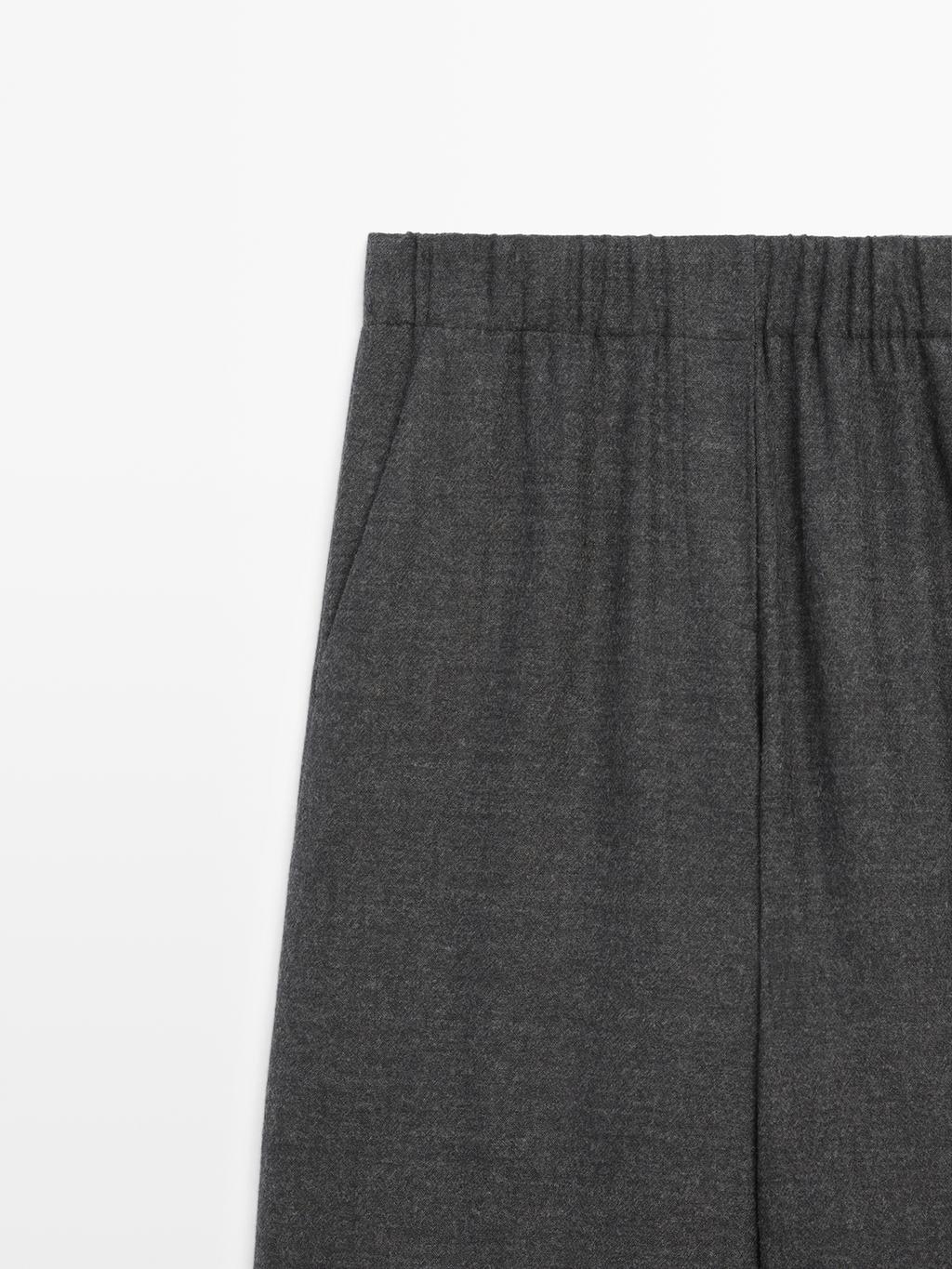 100% wool wide-leg textured trousers