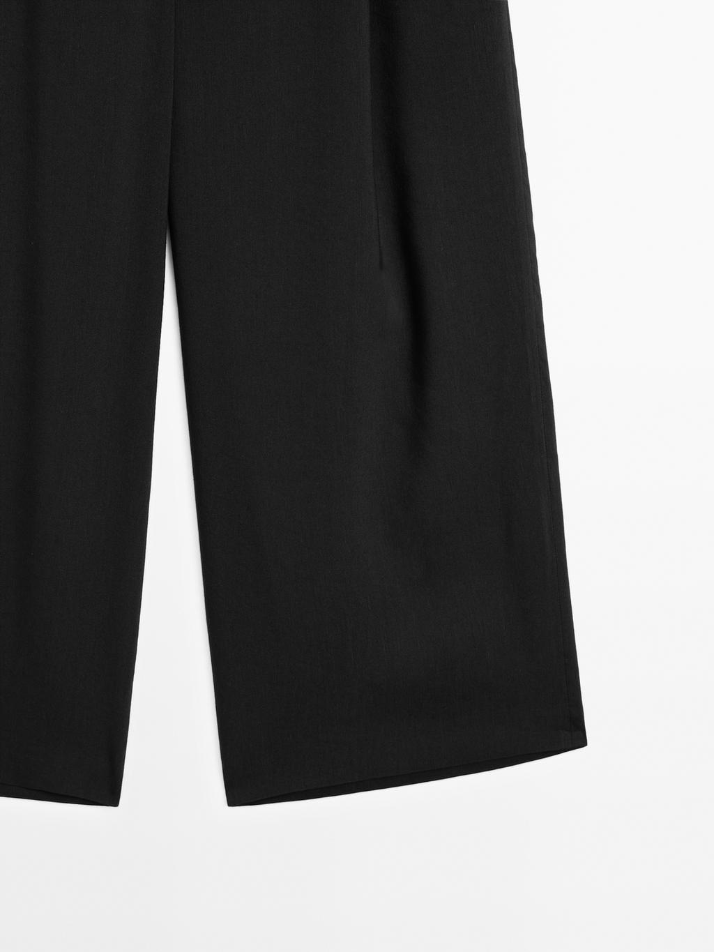 Flowing linen blend trousers with darts