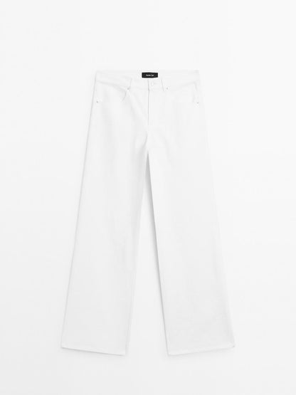 Textured wide-leg denim-effect trousers