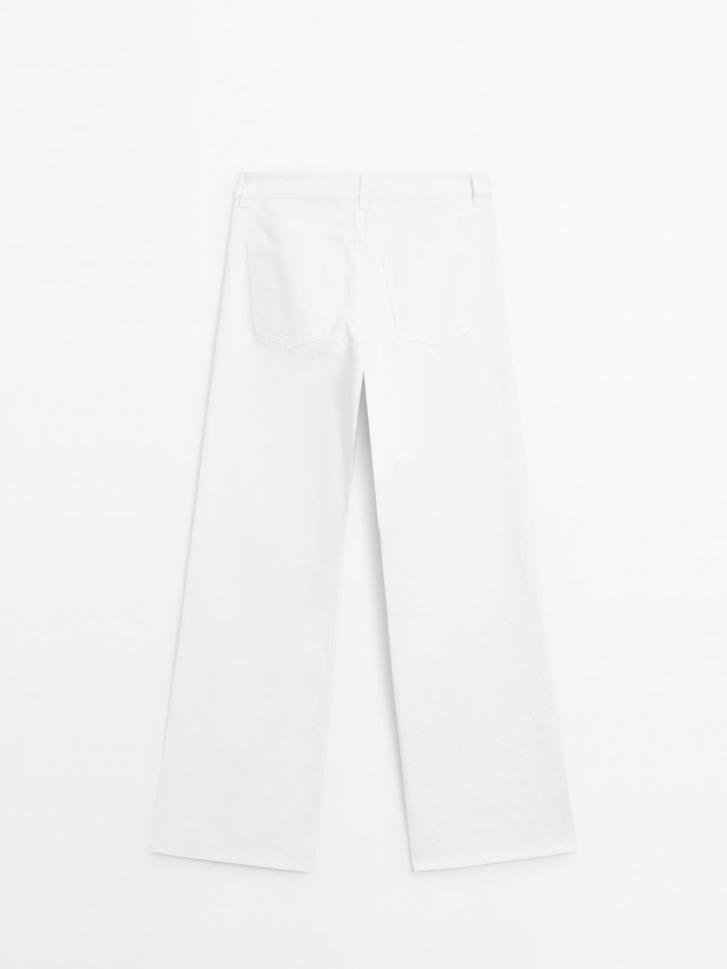 Textured wide-leg denim-effect trousers