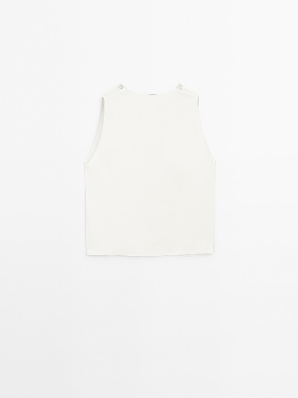 Flowing blouse with lace detail