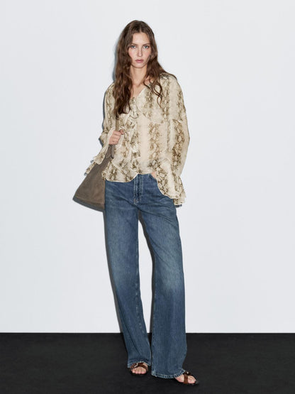 Snakeskin print blouse with ruffles