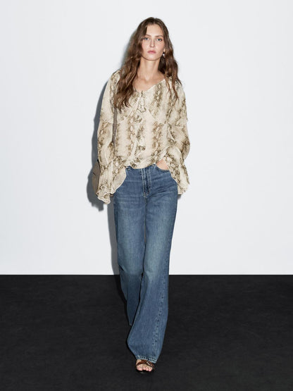 Snakeskin print blouse with ruffles