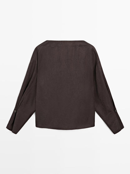 Flowing blouse with button details