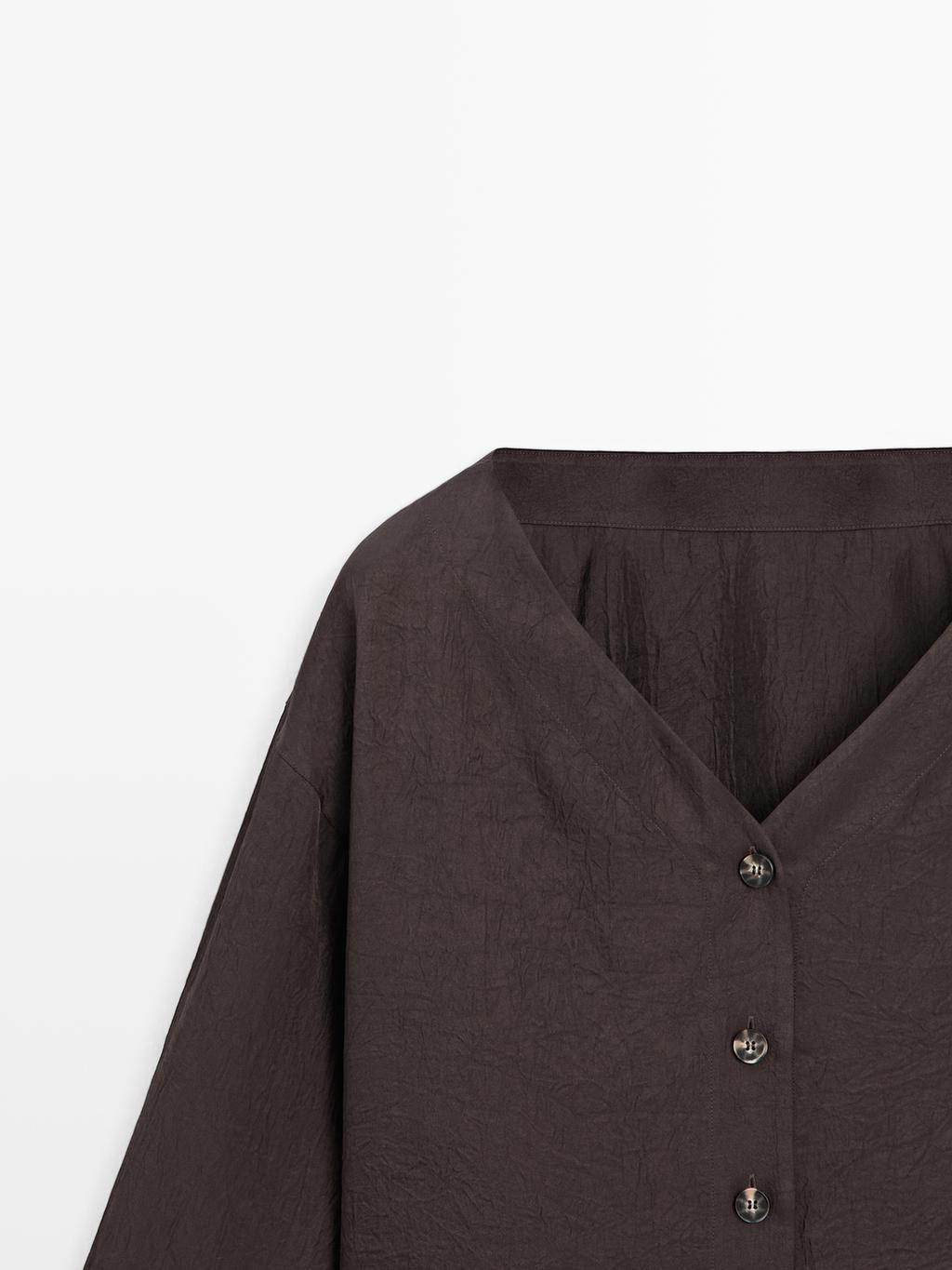 Flowing blouse with button details