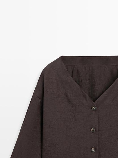 Flowing blouse with button details