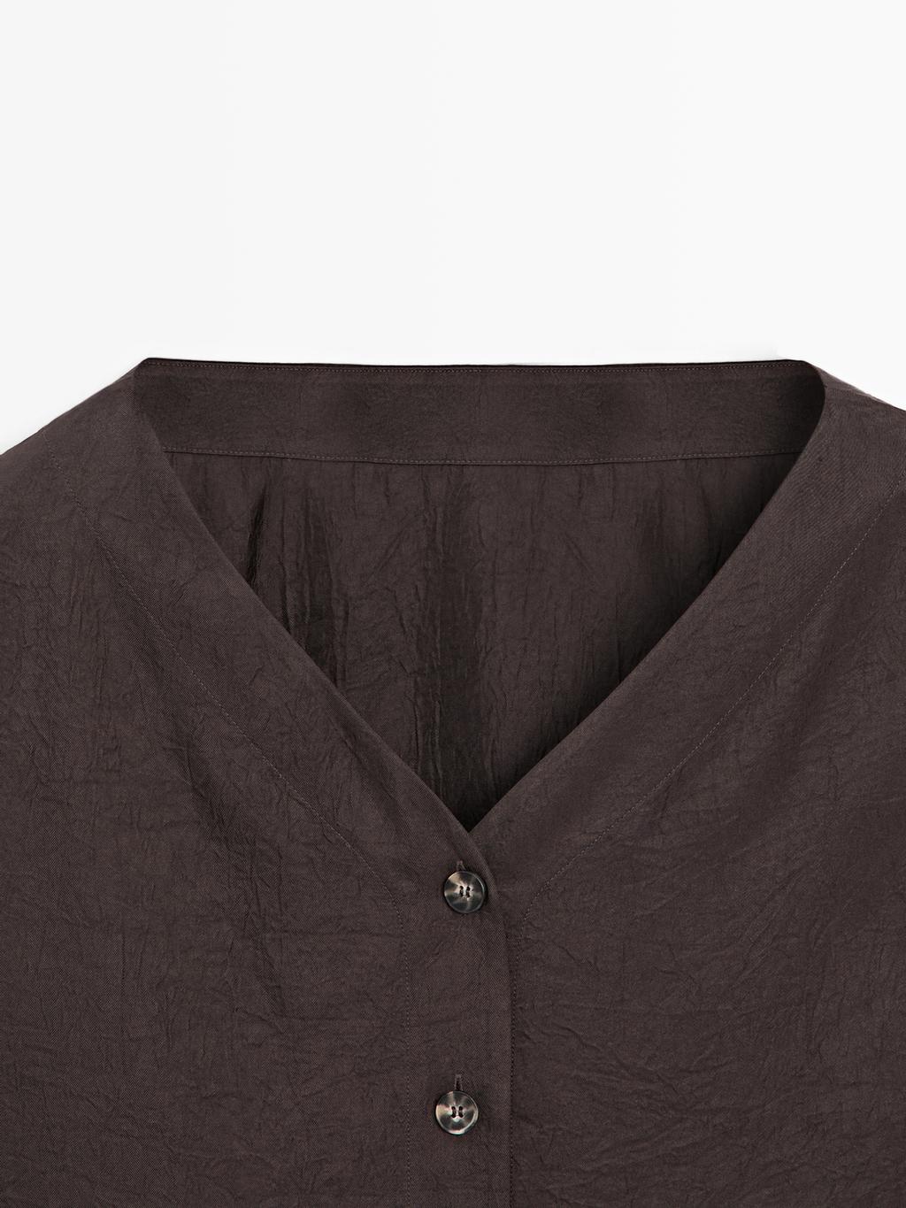 Flowing blouse with button details