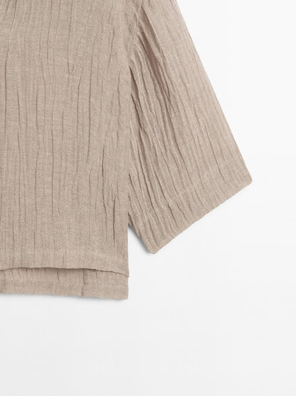 Flowing linen blend blouse with open neckline