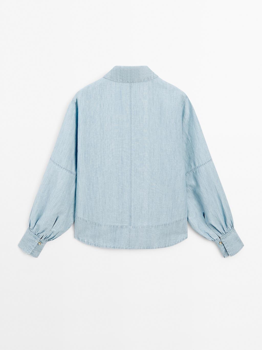 Oversize denim blouse with puff sleeves