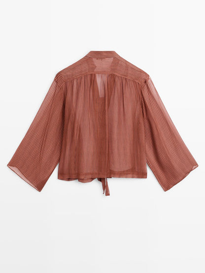 Semi-sheer shirt with tie detail