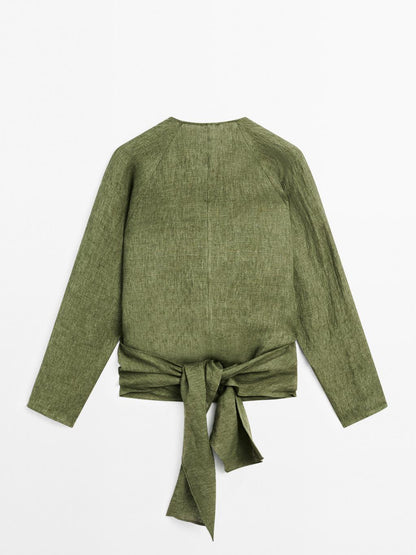 Flowing linen blouse with tie detail at the waist