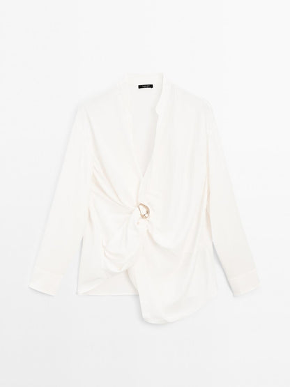 Blouse with knotted neckline and brooch detail