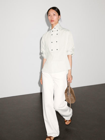 Flowing shirt with button detail on the chest