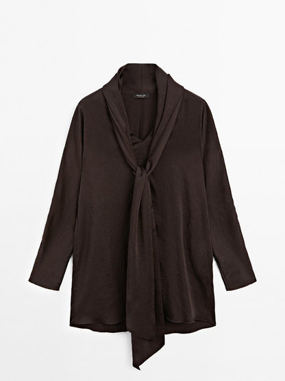 Long flowing blouse with tied neck